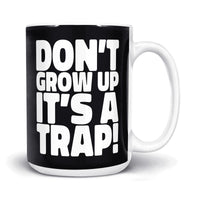 Load image into Gallery viewer, Don&#39;t grow up, It&#39;s a trap Mug 15oz black color
