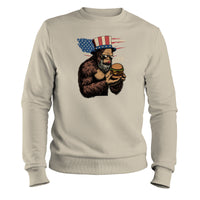 Load image into Gallery viewer, party delicious, big foot eating a hamburger patriotic design
